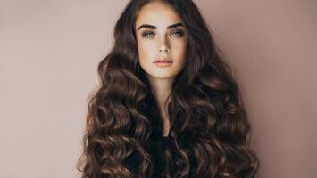 photo of woman with super long hair