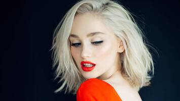 woman with platinum blonde hair and red lipstick