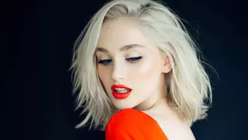 woman with platinum blonde hair and red lipstick