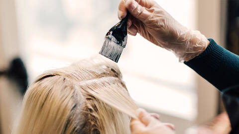 blonde woman on an overprocessed hair break