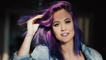 photo of woman with ultra violet hair color