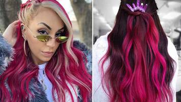 Woman with bright magenta hair