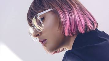 photo of woman with short pastel pink hair