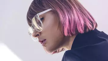 photo of woman with short pastel pink hair