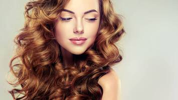 photo of woman with curly hair dyson airwrap