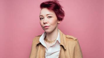 photo of woman with cranberry hair color