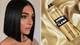photo of woman with a sleek blunt bob haircut and Redken Shine Flash Glass-Like Shine Hairspray