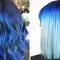 photo of woman with classic blue hair color pantone color of the year
