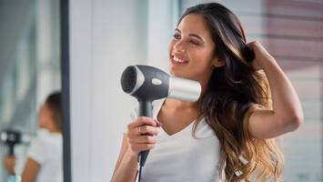 woman drying basic hair