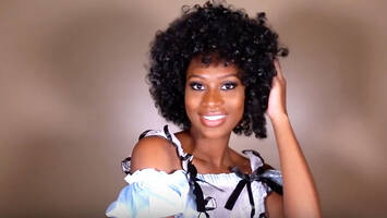 photo of woman wearing curly halloween wig