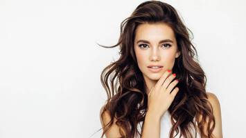 photo of woman with voluminous hair root perms