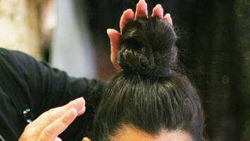 photo of bun hairstyle for growing out hair