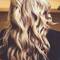 photo of blonde hair woman at hair salon