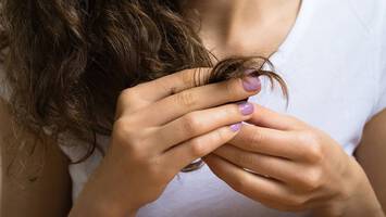 photo of woman's damaged hair matrix biolage advanced repair review