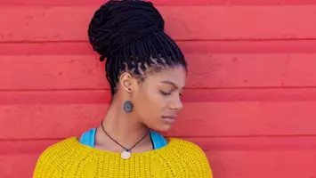 photo of woman with natural braided hairstyle