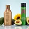 A lineup of four hydrating shampoos—Biolage, Redken, Matrix, and Pureology—arranged on a glossy surface surrounded by ingredients like aloe, avocado, and sunflower, visually highlighting moisture and softness.