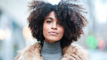 photo of woman with natural textured hair
