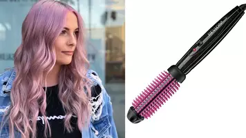 photo of curled hair and curling brush iron