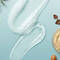 image of Redken, Loreal Paris, and Keratase products on a blue background
