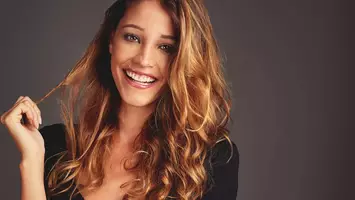photo of woman with iced caramel latte hair color