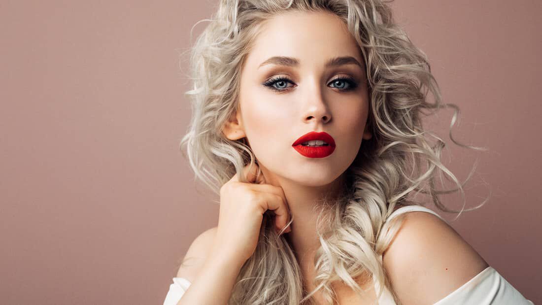 photo of woman with platinum blonde hair throwback hair colors