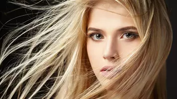 photo of woman with long blonde hair