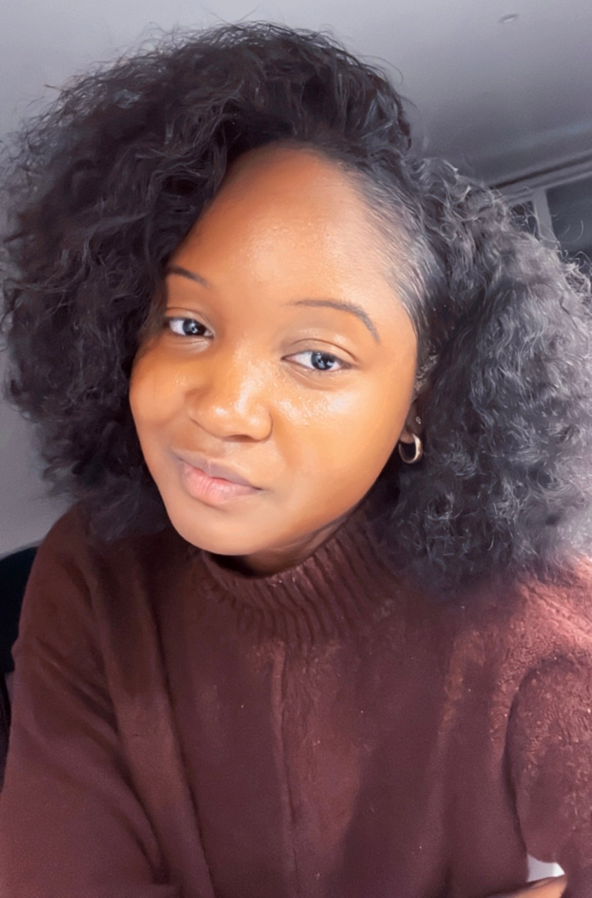 Cheyenne Bunsie one of our beauty editors complete Kérastase Curl Manifesto review for curly and coily hair types