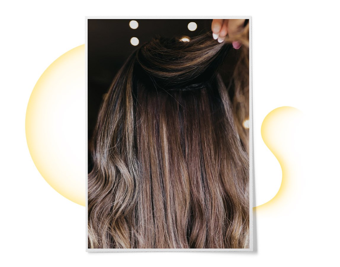 Beach bum brunette will keep your hair sunkissed long after the seasons change. Here’s how to get the look, according to a pro colorist.