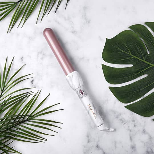photo of foxybae white marble rose gold curling wand