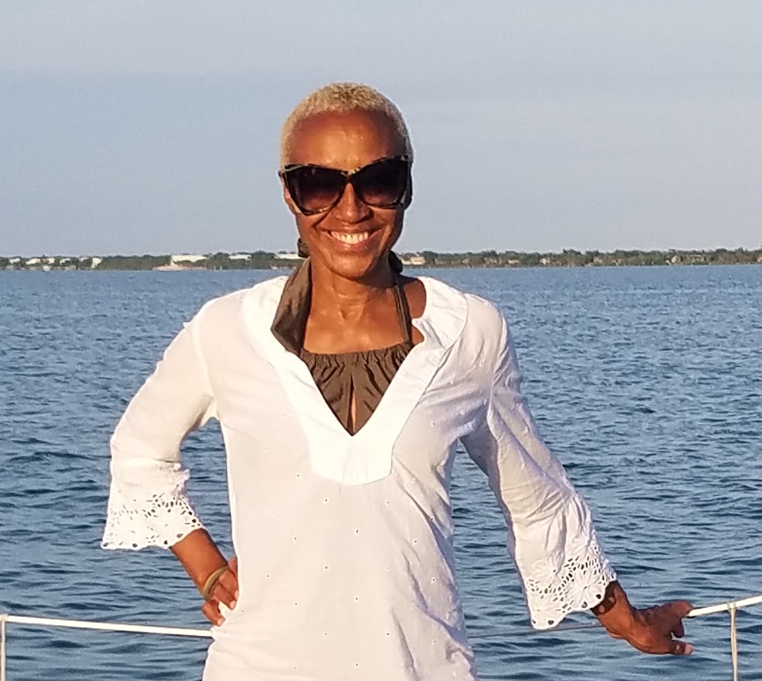 Writer Gerrie Summers embracing her newly shaved hairstyle.