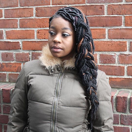 sideswept braid faux locs hairstyle