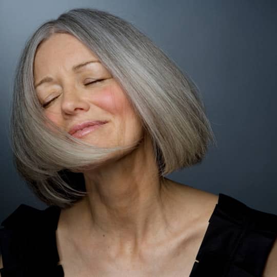 Woman over 50 with a classic lob hairstyle