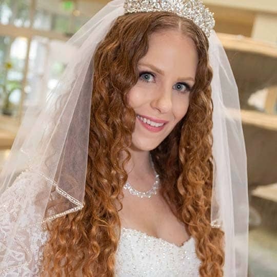 Writer Diance Mary embraces natural curly hair on her wedding day.