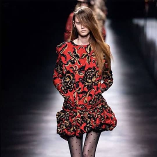 woman walking paris fashion week
