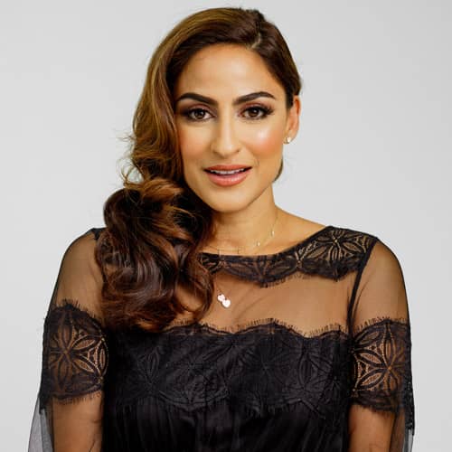 woman with curled brown hair 