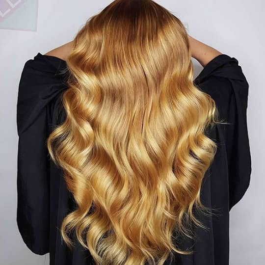 photo of woman with long blonde hair hair rinses