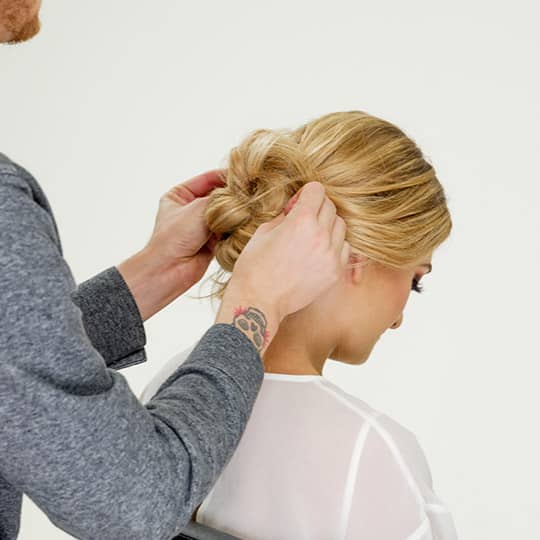 man making bun for women's new years even bun
