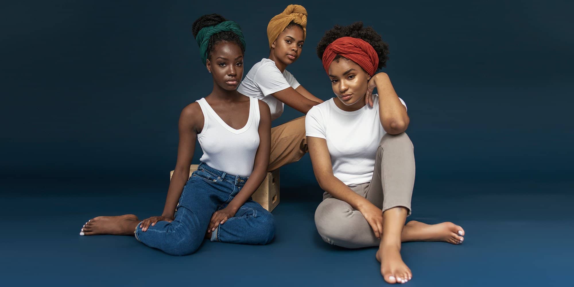 three women wearing the wrap life head wraps