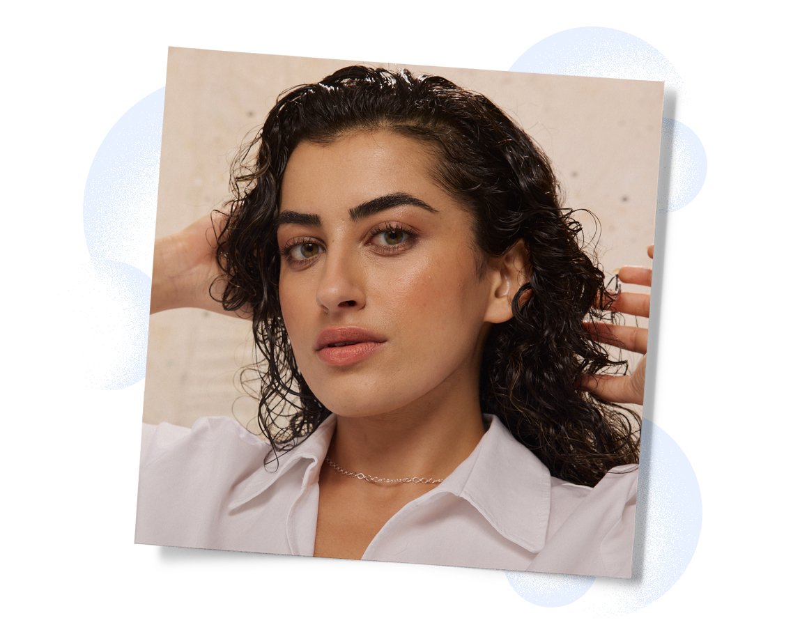 A woman wearing a wet wavy look