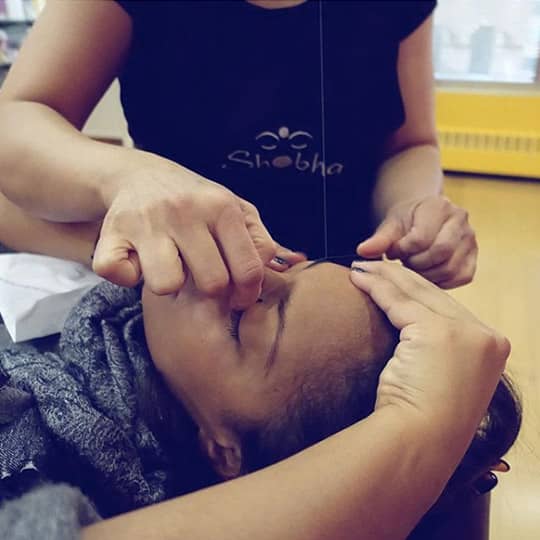 threaded eyebrows