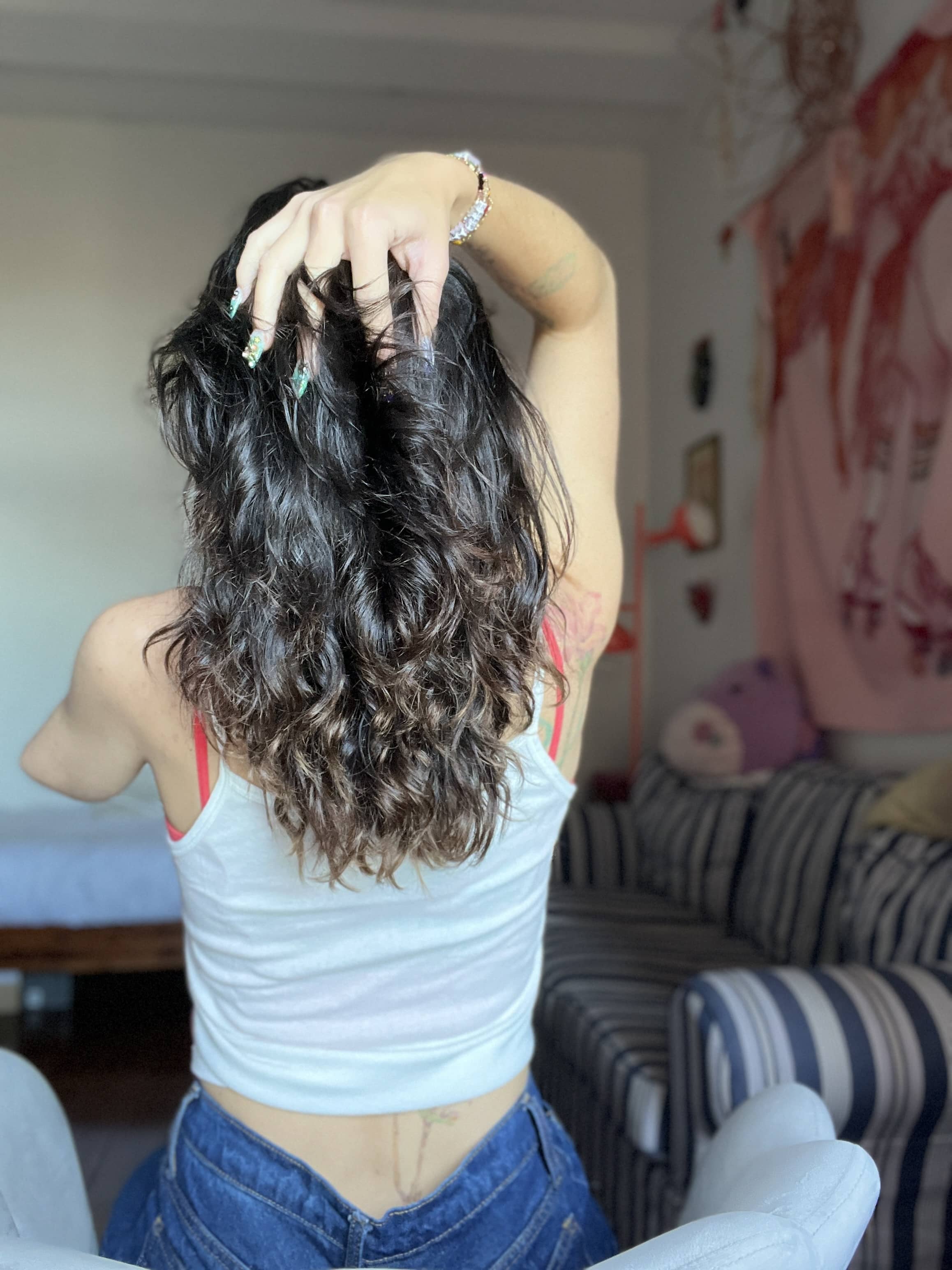 Chloé Valentine Toscano shares how having her arm ampitated chaged her relationship with having unruly hair