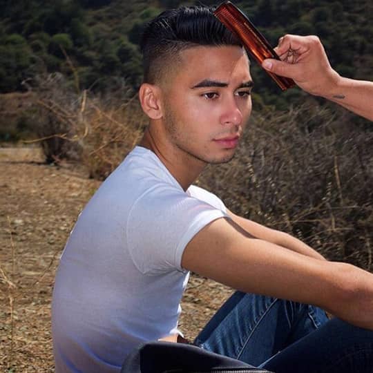 photo of man with pompadour hairstyle