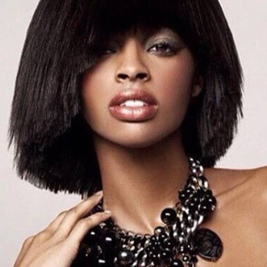photo of woman with asymmetrical bangs