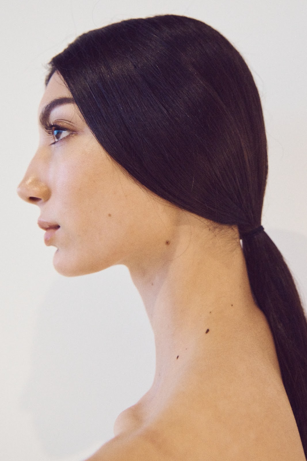 Woman with low ponytail at NYFW 2020