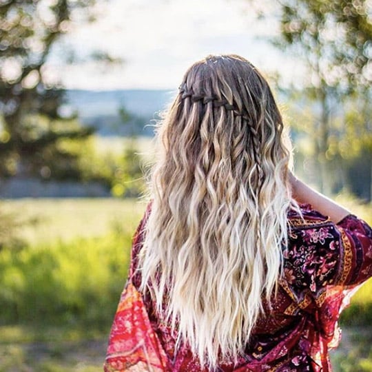 zodiac hairstyles beachy waves and a waterfall braid
