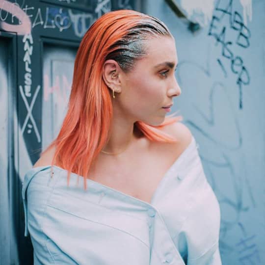 woman with slicked back hairstyle