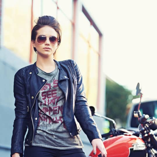 Photo of biker woman with a mini-pompadour hairstyle