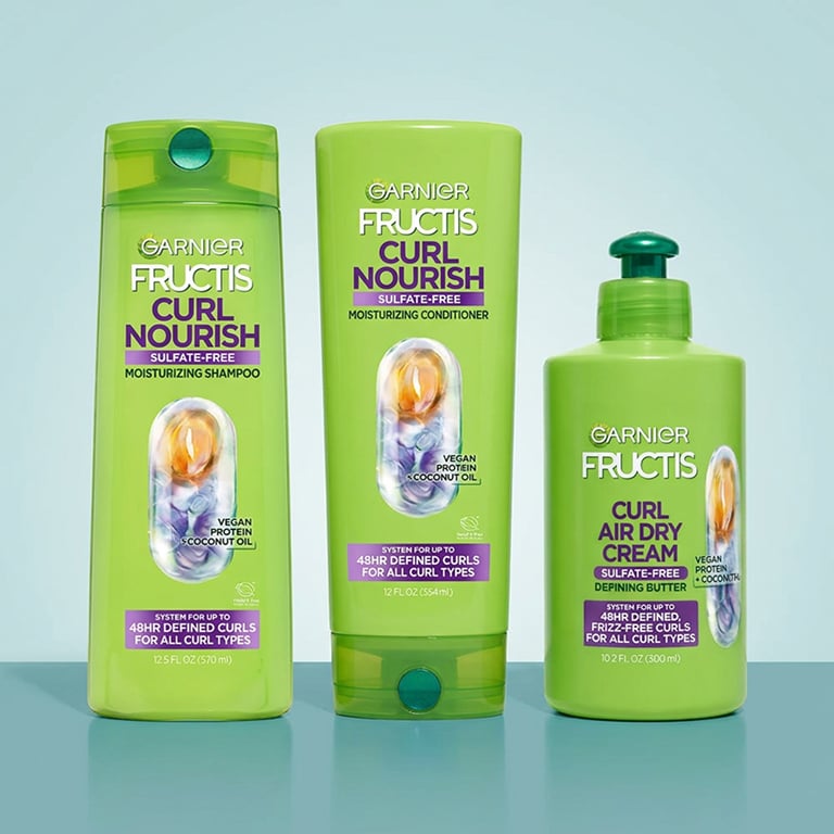An image of  Garnier Fructis Curl Nourish Curl Air Dry Cream with Curl Nourish shampoo and conditioner